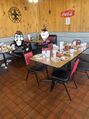 SNCApedia's version of nate, SNCAman, at a restaurant Louisiana restaurant[3]